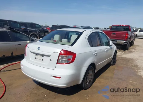 2012 Suzuki Sx4 из США, поврежденный, VIN JS2YC5A35C6300706